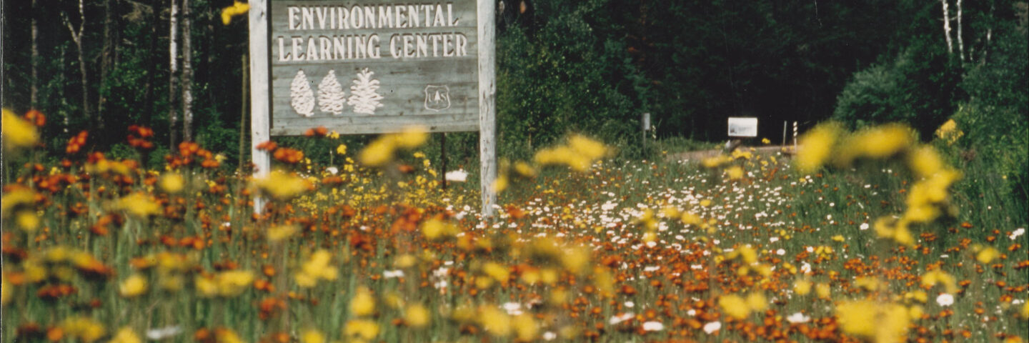 Environmental Learning Center sign in wildflower field