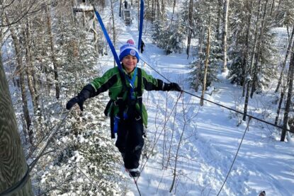 Student on ropes course in winter