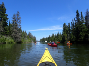 kayaking on blue lake