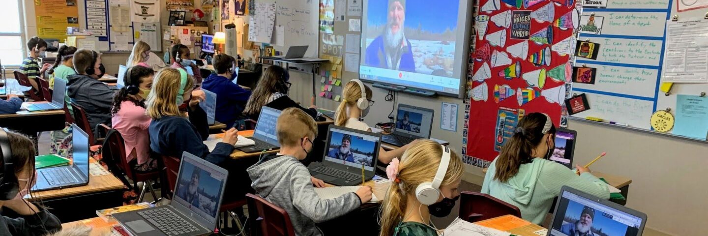 Students in classroom on virtual field trip at Wolf Ridge